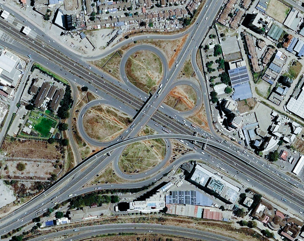 Aerial view of a multi-level Nairobi road junction and surrounding urban infrastructure